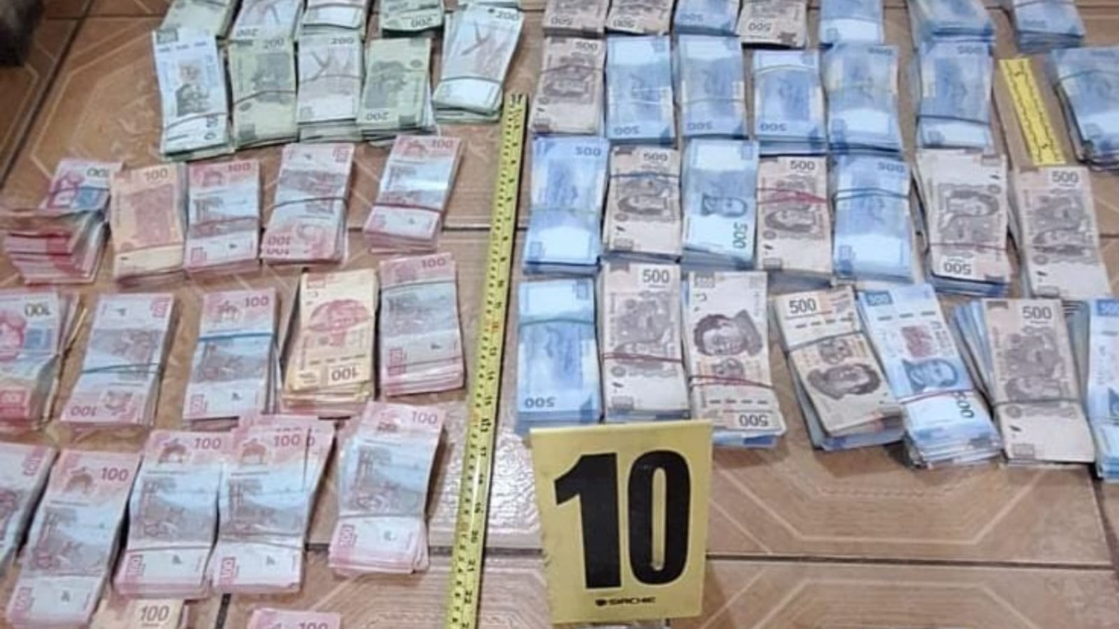 Operación conjunta lleva a la detención de seis personas con 2.8 millones de pesos mexicanos